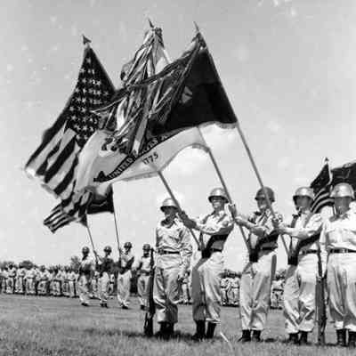 Soldiers holding flags
