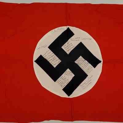 Nazi flag signed by 180th Infantry 1st Platoon Medics