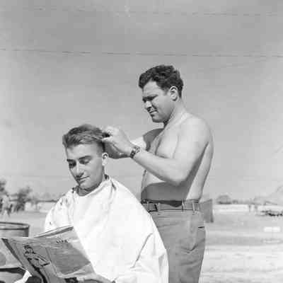 Soldier getting haircut