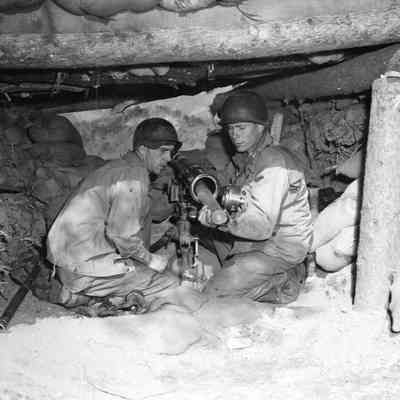 Soldiers loading Recoilless Rifle