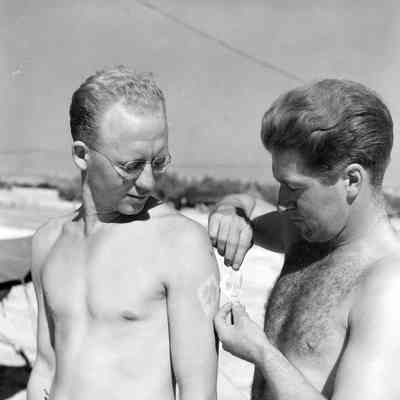 Soldier showing off "tattoo"