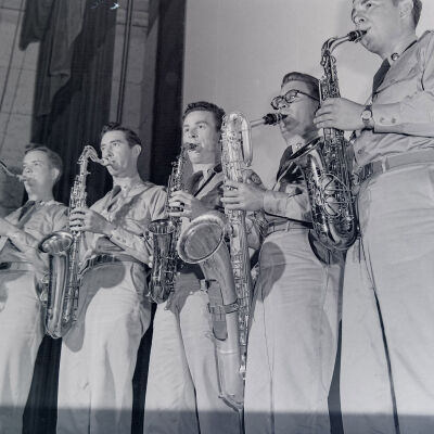 Soldiers playing the saxophone at Camp Crawford