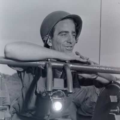 Soldier operating an unidentified piece of equipment