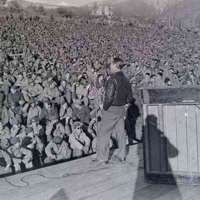 Soldiers watch entertainer Joe E. Brown