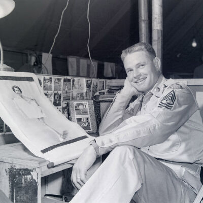 Portrait of a soldier with pin-up art
