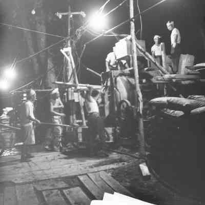 Japanese civilians using cement mixer