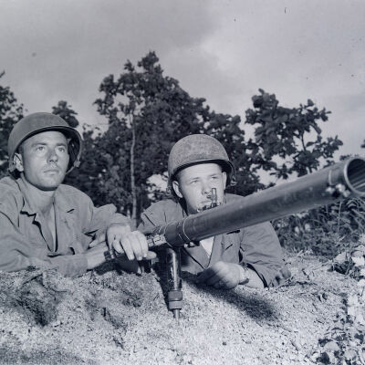 Crew with recoilless rifle