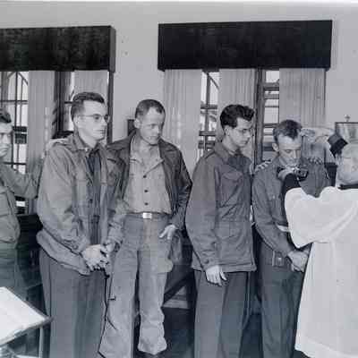 Soldiers participating in a religious ceremony