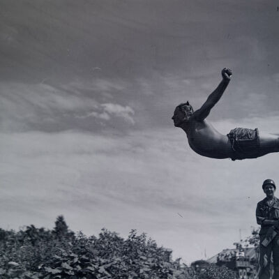Soldier diving into water
