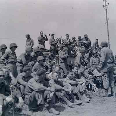 Soldiers listening to band