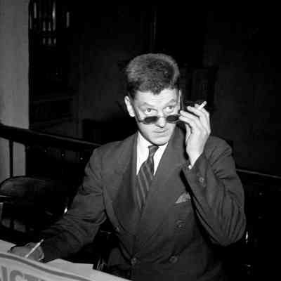 Well-dressed man smoking