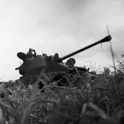Tank commander seated in turret