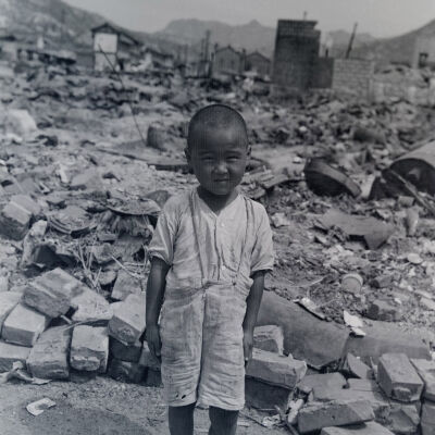 Japanese child amid ruined city