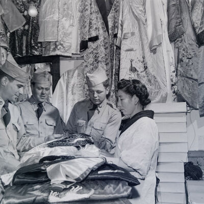 Soldiers shopping for silk kimonos