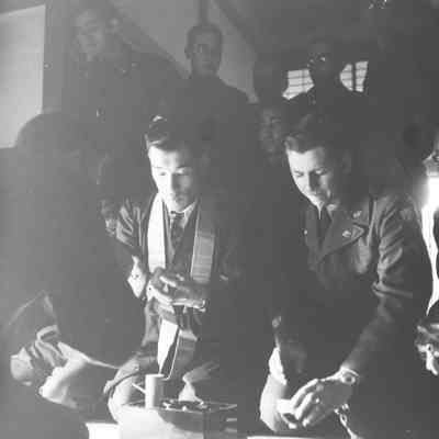 Soldiers and Japanese civilians at a tea ceremony
