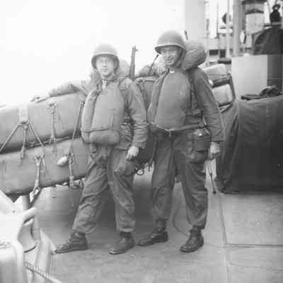 Soldiers on deck with life vests