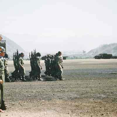 Soldiers marching during a review