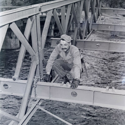 Soldier constructing a bailey bridge