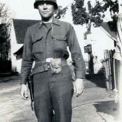 Soldier standing in village