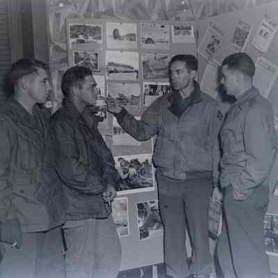 Information and Education officer briefing soldiers