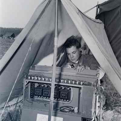 Soldier operating a field switchboard