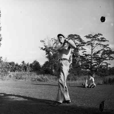 Soldier playing golf