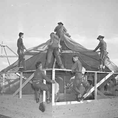 Ridged-wall tents under construction