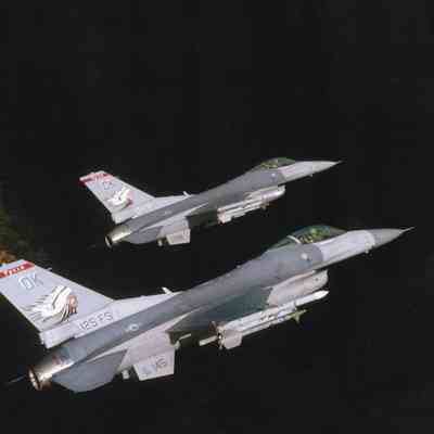 Two F-16s in flight