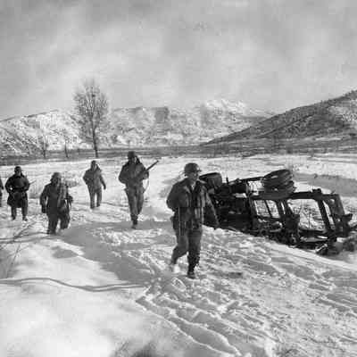 Soldiers march through snow