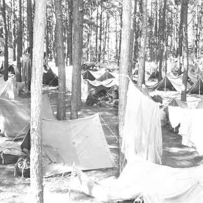 Soldiers in a pup tent encampment