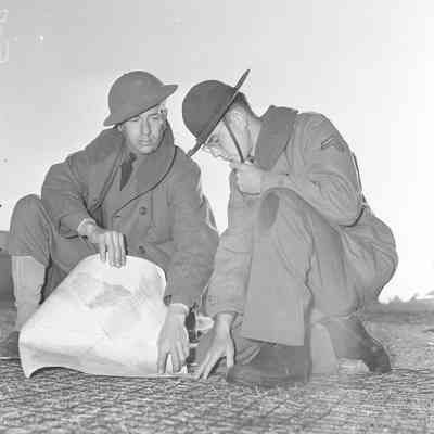 Soldiers examining a map