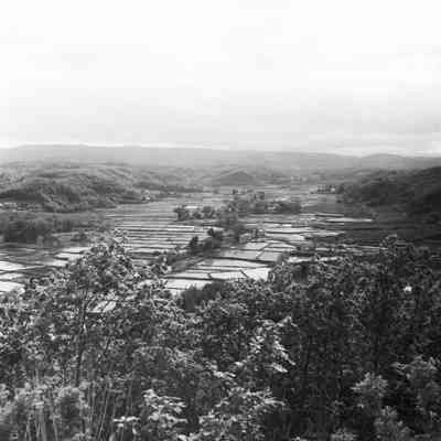 Scenic view of rural farm valley