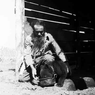 Ainu man with bear cub