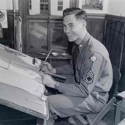 Portrait of a soldier at his drawing board