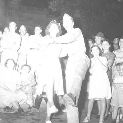 Soldiers and civilians at a dance