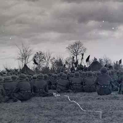 Soldiers sitting during ceremony