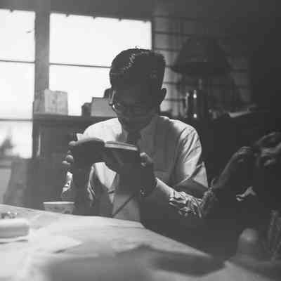 Japanese man reading a book