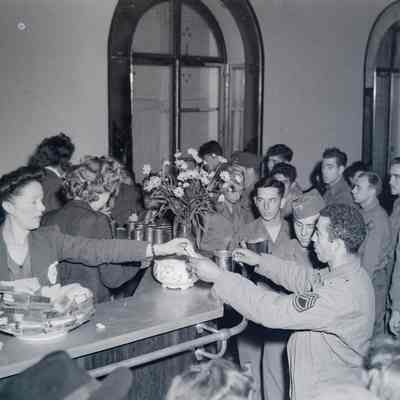 Soldiers being served sandwiches at rest camp