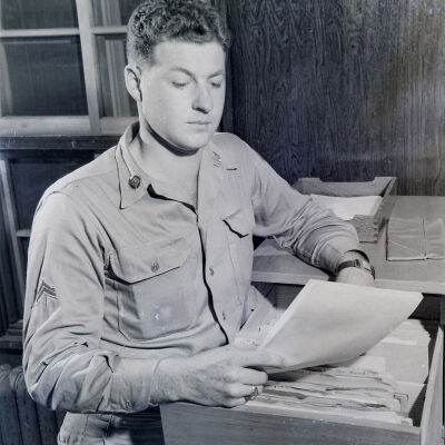 Clerk at his filing cabinet