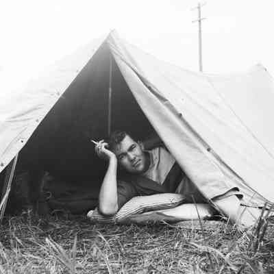 Portrait of a soldier in his pup tent
