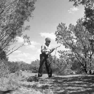 Soldier holding rifle at the ready