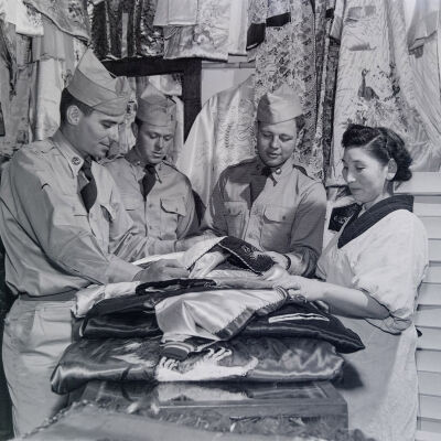 Soldiers shopping for silk kimonos