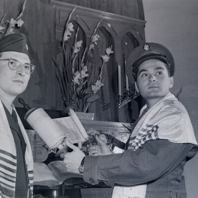 Jewish Chaplain and congregant at worship service