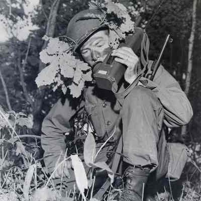 Soldier talking on a walkie-talkie
