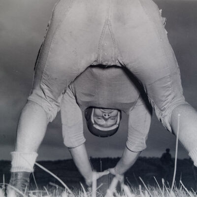 Looking between the legs of a football center