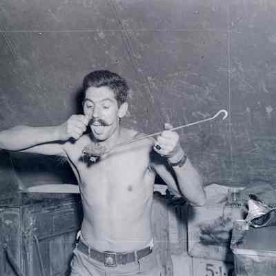 Soldier with spoonful of food