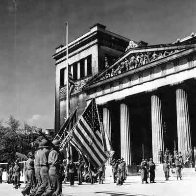 Soldiers marching with flags