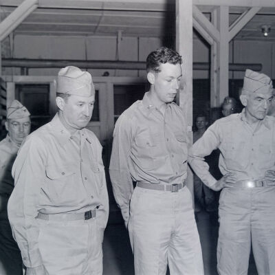 Officers inspecting a Quartermaster building