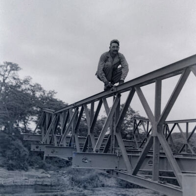 Soldier constructing a bailey bridge