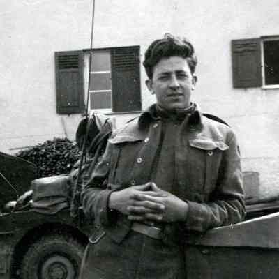 Soldier leaning on trailer